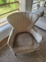 Fauteuil beige assise à ressort