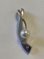 Pendentif en or 18 carats avec deux petits diamants