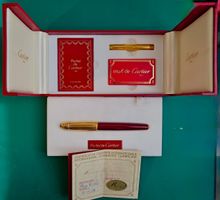 Plume Pasha de Cartier plaqué or bordeaux 1989