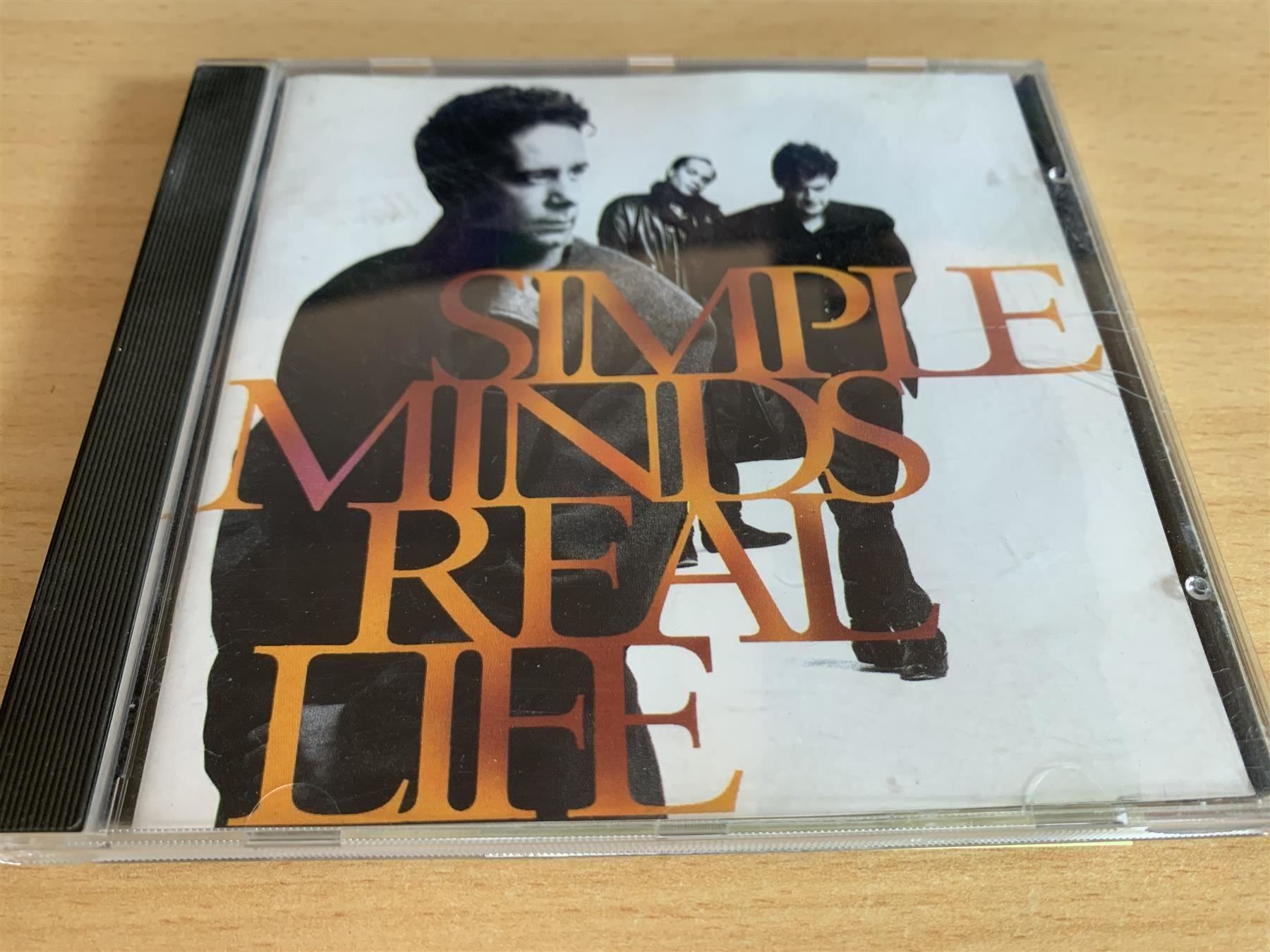 CDs: Simple Minds – Real Life – Gebraucht aus Rikon im Tösstal von Alpenmutz