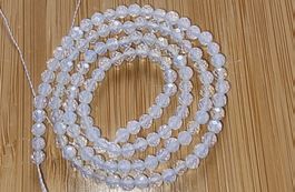 Opal weiss facettiert 3mm. Strang