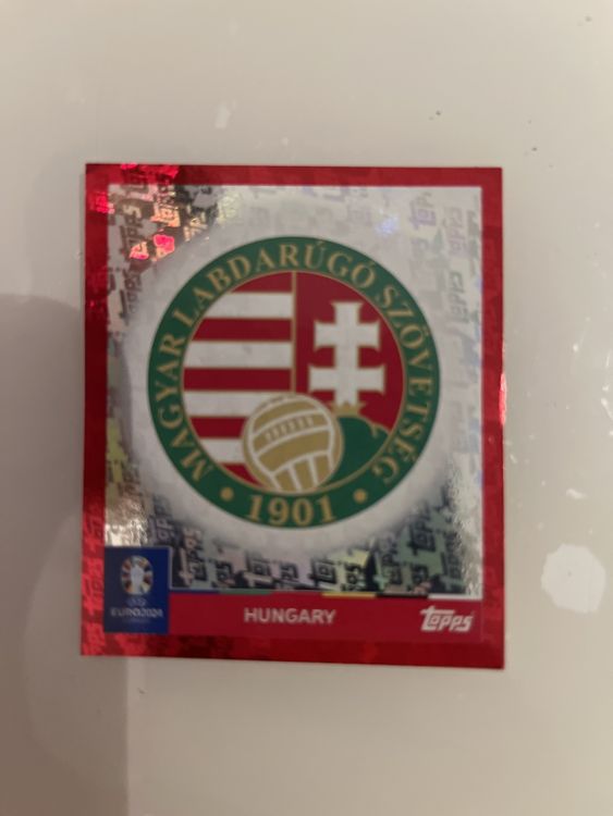 Sticker Topps EURO 2024 - HUN1 Hongrie Emblem - Rose/Blush Parallel - Swiss