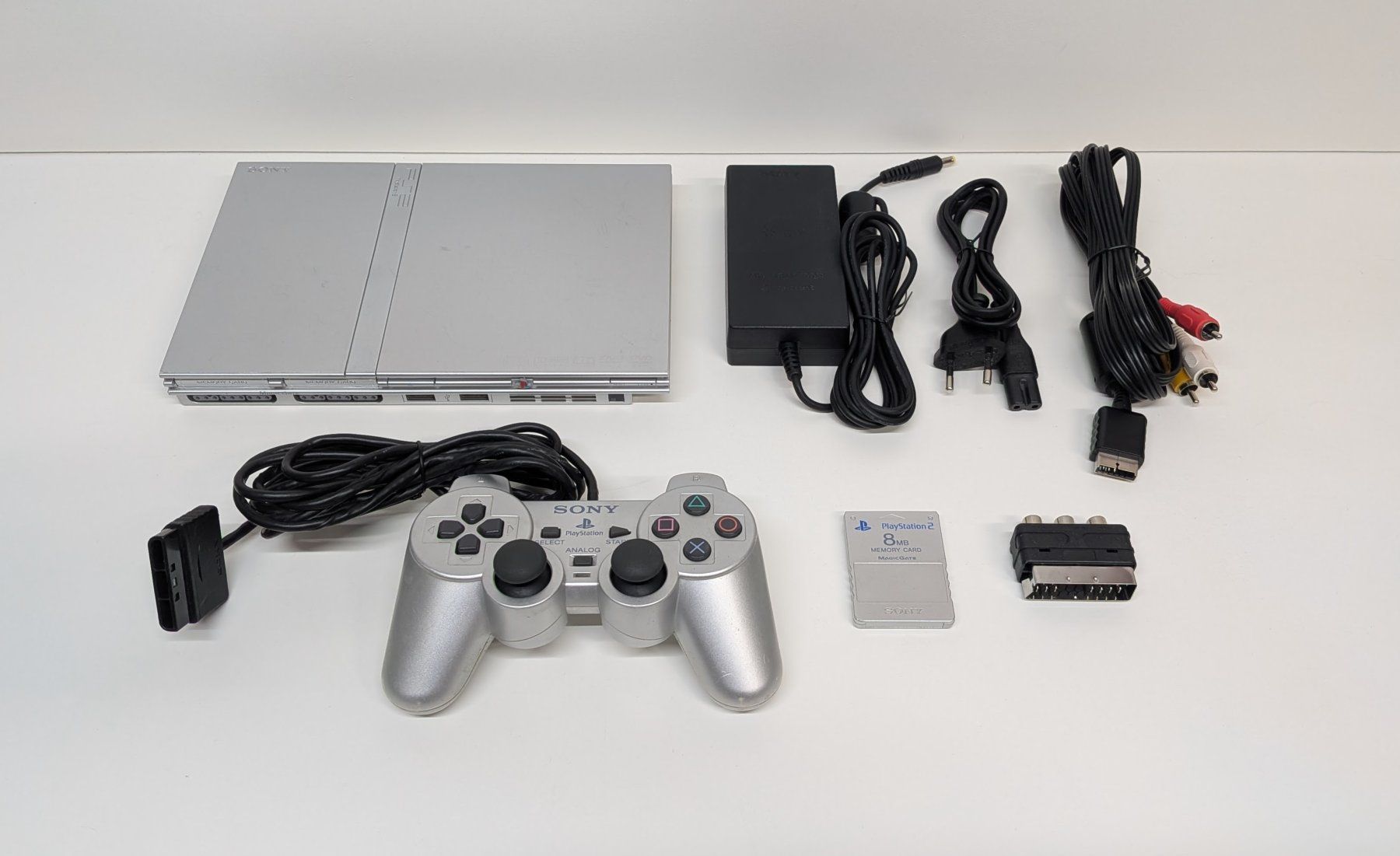 Sony Konsolen: PlayStation 2 Slim Silver mit Controller ORIGINAL – Gebraucht aus Menziken von mame18
