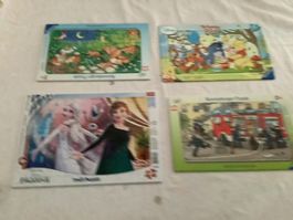 3 Ravensburger 1 Trefl Puzzle