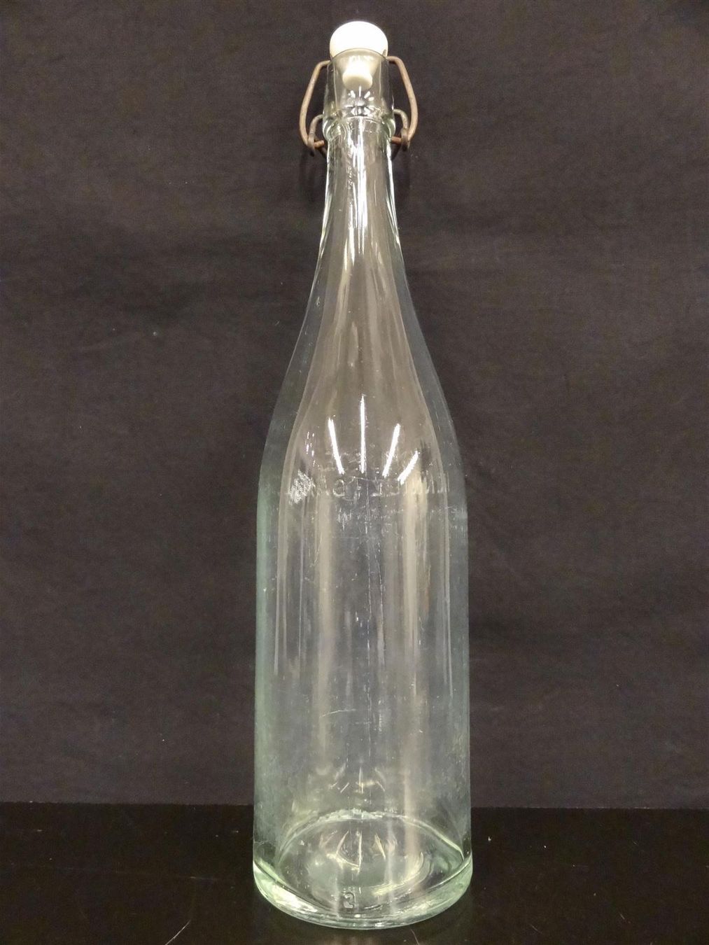 Bicchieri, Caraffe & Bottiglie: alte Flasche HENNIEZ SANTÉ – Usato da Kerzers venduto da Flaschenposten 2