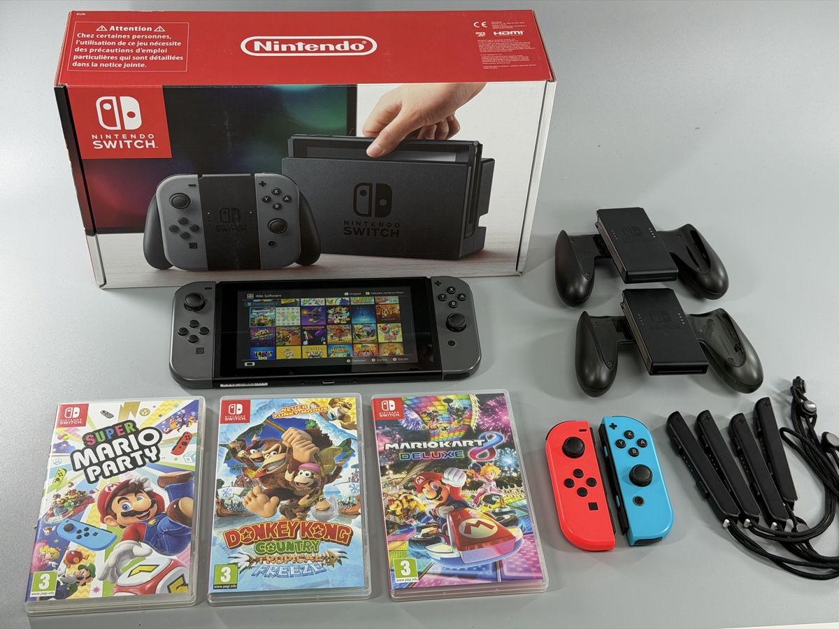 Nintendo Console: Nintendo Switch Grau + 3 Games - Top Zustand! – Usato da Sennhof venduto da Johnbest