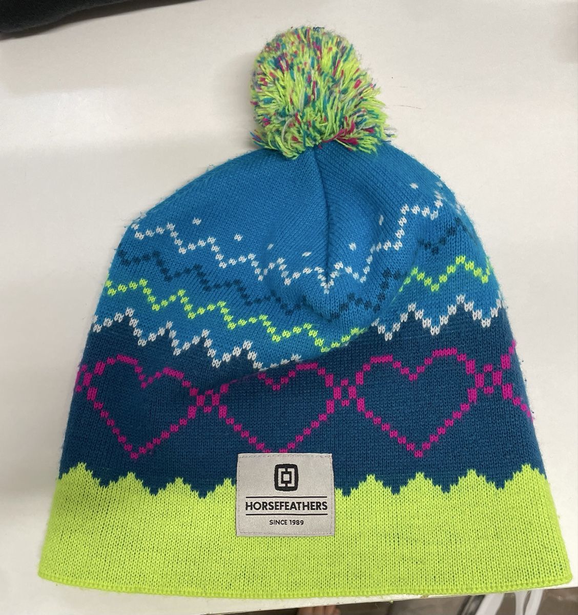 Copricapi, berretti & cappellini: Horsefeathers Wintermütze mit Bommel bunt – Usato da Schönenberg ZH venduto da fri_w6t6