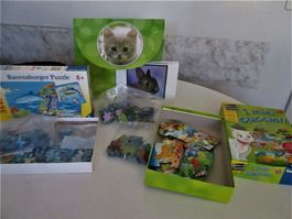 3 Packungen mit Puzzles