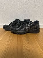 Baskets New Balance 740 noire taille 39.5 bon état