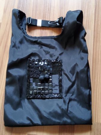 Schwarze Einkaufstasche mit Pailletten und Krälleli