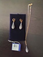 Ensemble collier et boucles d'oreilles Swarovski