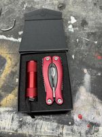 Multitool Taschenwerkzeug rot mit Lampe neuwertig