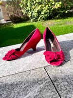 Rote Pumps