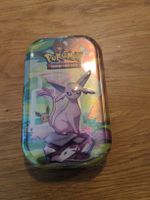 Prismatic Evolutions Tin En