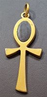 Q901 - Anhänger Kreuz goldig Farbig mit Schwarzem Stein?