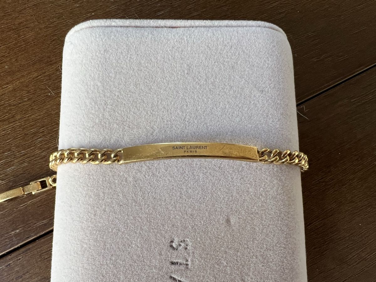 Saint Laurent Bracciali & Braccialetti: Saint Laurent Paris Armband, goldfarben – Nuovo (secondo la descrizione) da St. Gallen venduto da sih_2z86