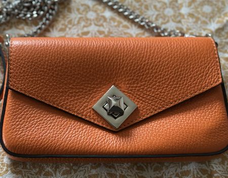 Ledertasche orange mit Silberverschluss, neuwertig!