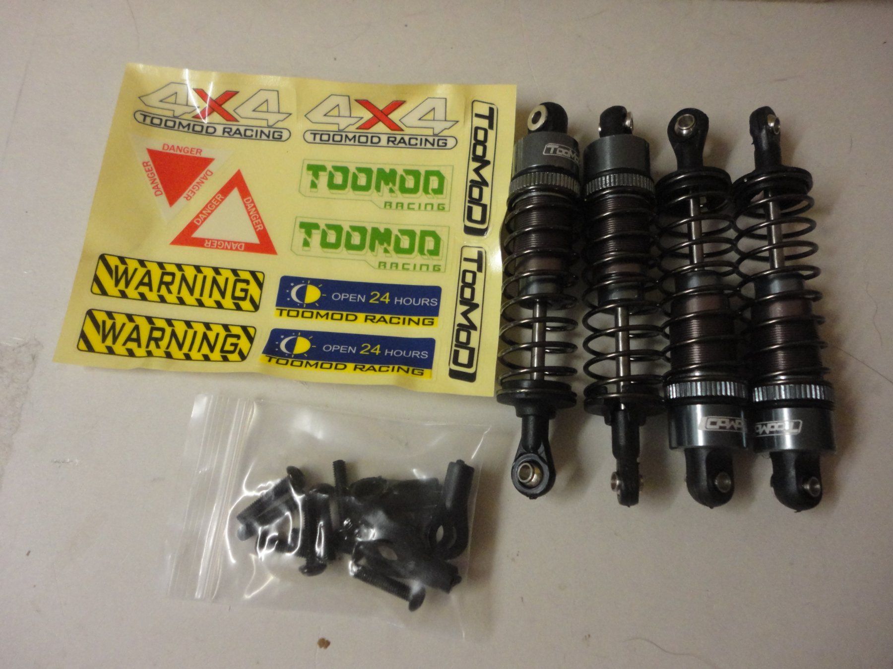 RC Modellbau: 4 Metall-Stossdaempfer Set,1:10 Neu – Neu und originalverpackt aus Horgen von RcModell 1