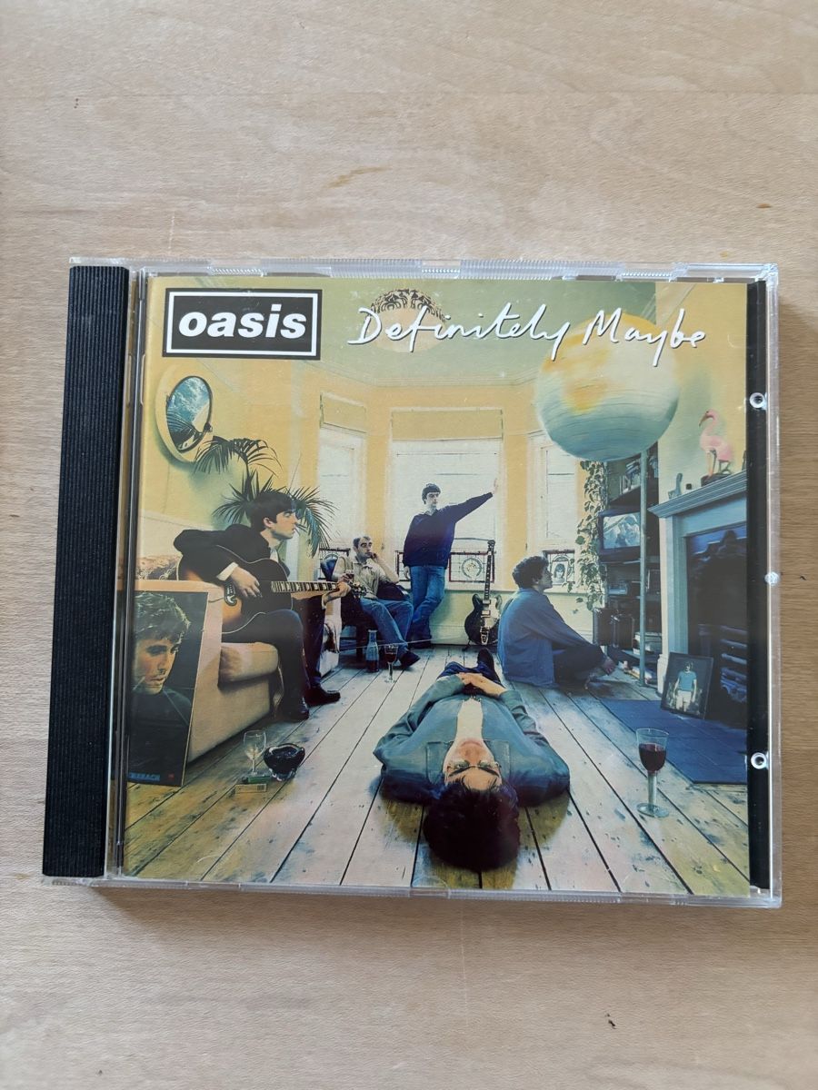 CDs: Oasis - Definitely Maybe (CD) – Gebraucht aus Zürich von Interpol