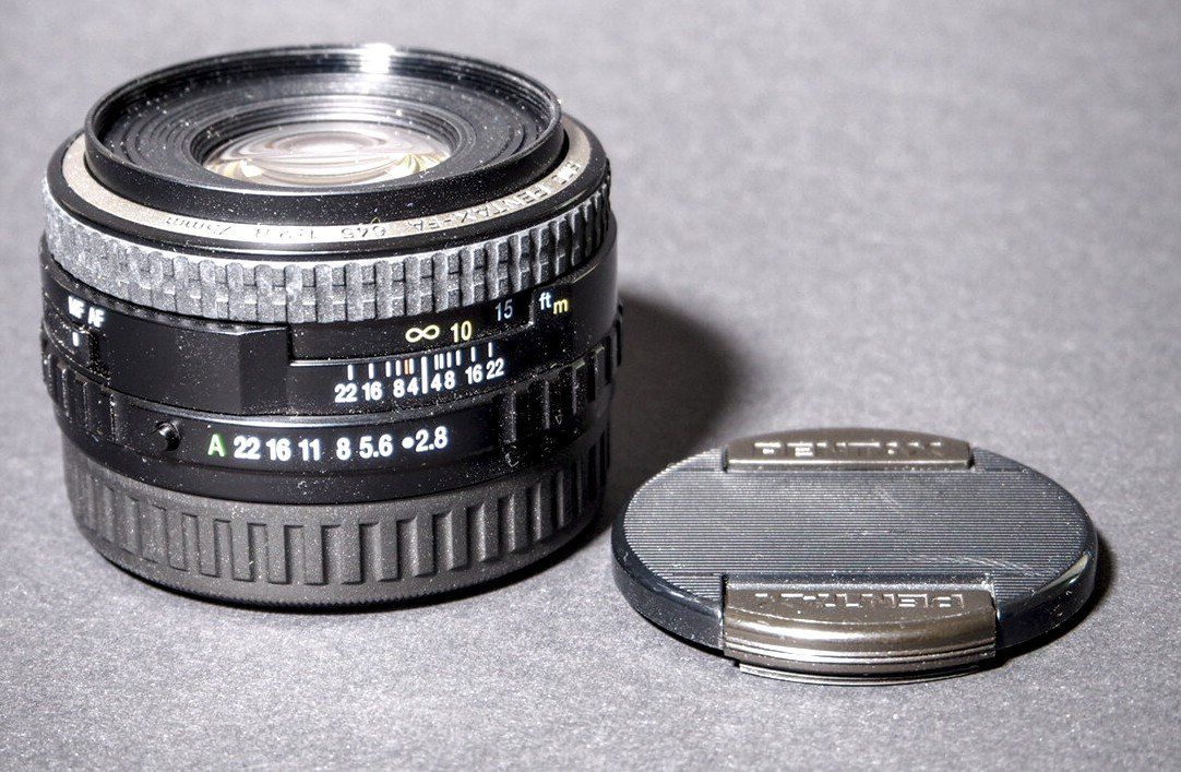 Pentax Objektive: Objectif 75mm Pentax 645 (défectueux) – Defekt aus Monthey von PhilippeZ
