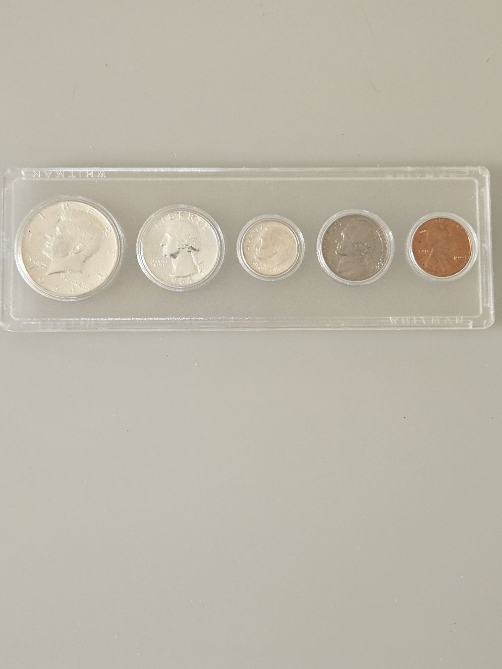 Alle Münzen: collection de 5 pièces USA de 1964 – Neu und originalverpackt aus Cortaillod von lemaurice01
