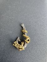 Drache mit Fischhaken
