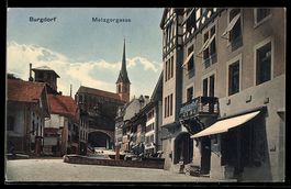 AK Burgdorf, Metzgergasse mit Brunnen und Blick zur Kirche