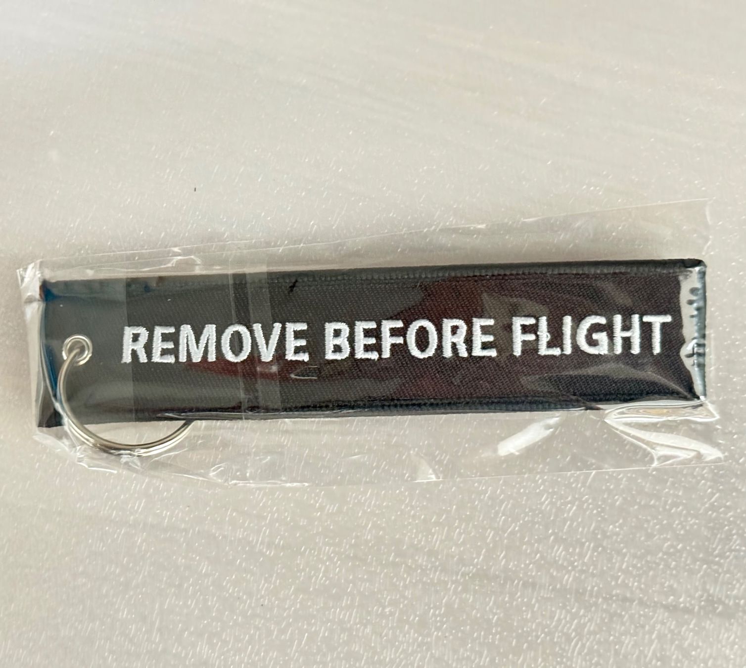 Porte-clés: Porte-clés "Remove before flight" - Air Canada Noir – Neuf (Voir description) à Denges par peumens 1