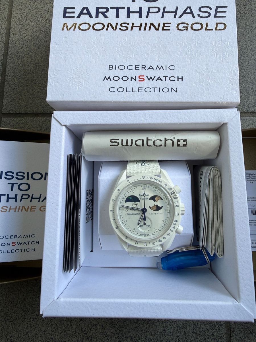 Swatch Montres: Swatch omega Moonshine Gold  – Neuf avec emballage d'origine à Sierre par isa_zty2 1