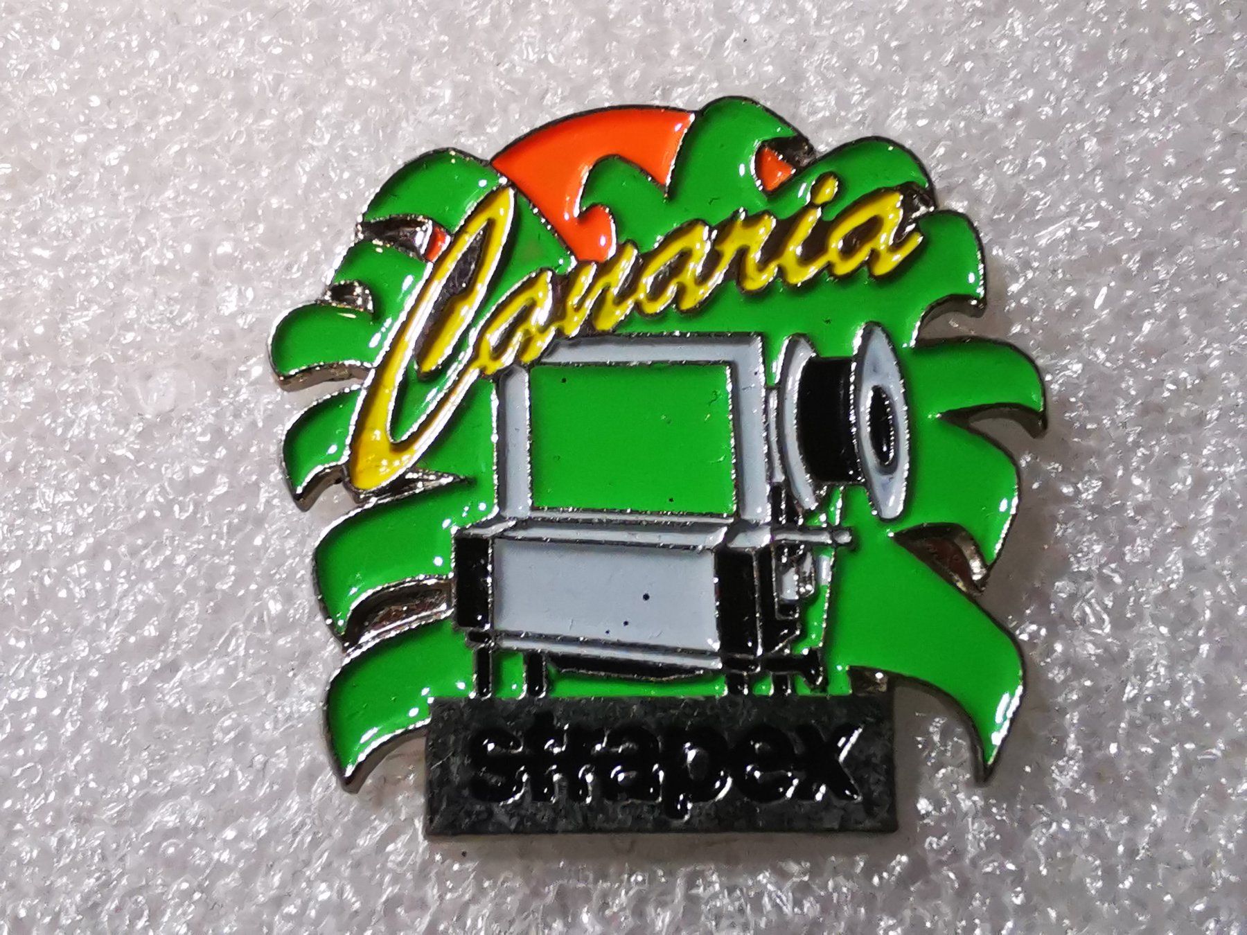 Placchette & Badge: Ansteckpin 15: Strapex – Usato da Oppligen venduto da Pin-Fall-Shop