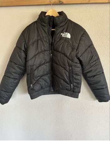 Veste The North Face noire taille S avec accroc