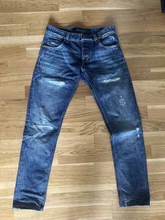 Dolce & Gabbana Men Ripped Blue Jeans in 44