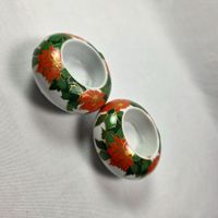 2 Teelichthalter mit Blumenmotiv – gebraucht