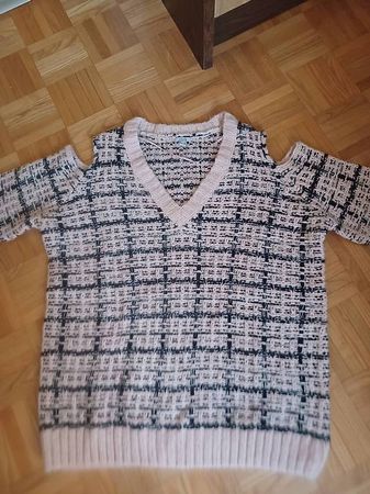 Pull en maille saumon et noir