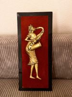 Nigerianisches Wandbild mit Saxophonspielerin