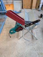 elektrische Kettensäge mit klappbarem Sägentisch