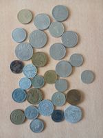 Konvolut Münzen verschiedener Länder und Wertigkeiten.