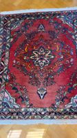 Beau grand tapis persan vintage fond rouge à grand médaillon