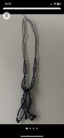 Lot de 3 bijoux :2 colliers et un bracelet.       