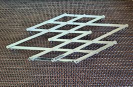 Dessous de plat extensible vintage en métal argenté!