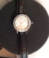 Montre dame avec Brillant - pile neuve - bracelet neuf