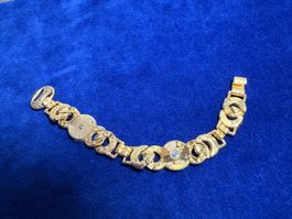 Armband goldfarben mit Gesichtern gebraucht guter Zustand