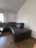 Grosses Ledersofa mit elektrisch verstellbarer Liegefunktion