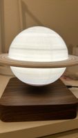 Magnetic levitation rotating Saturn lamp