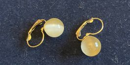 Paire de boucles d'oreilles dormeuses dorées