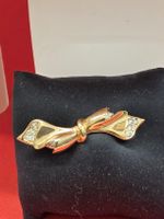 Brosche Schleife Goldimitat mit Zirkoniasteinen guter Zustan