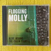 FLOGGING MOLLY-ALIVE BEHIND THE GREEN DOOR