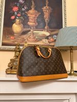 Louis Vuitton Monogram Alma Voyage MM Bag