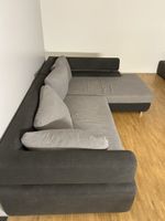 Ecksofa mit Schlaffunktion grau