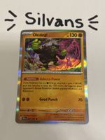 Okidogi Holo 057/131 Prismatic Evolutions Englisch